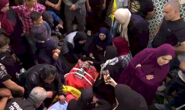 Filistinli annenin şehid oğluna son dokunuşu