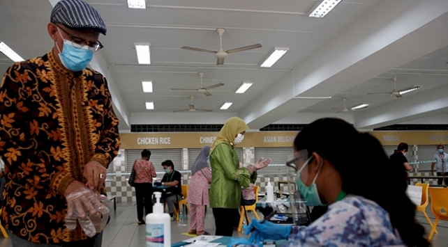 Singapur'da genel seçimler virüs gölgesinde yapılıyor