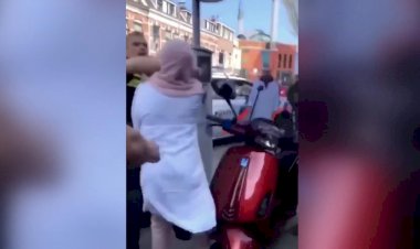 Hollanda polisi başörtülü bir kadını tekmeleyip yumrukladı